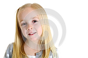 Cute blond girl with brown eyes and an endearing expression