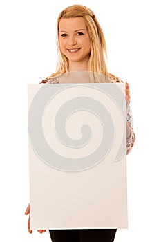 Cute blond woman with blank white banner isolated over white background