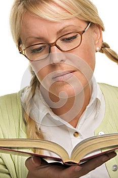 Cute Blonde Plays With Ponytails & Reads a Book photo