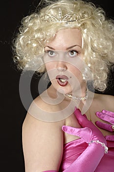Cute blonde with surprised look on her face photo