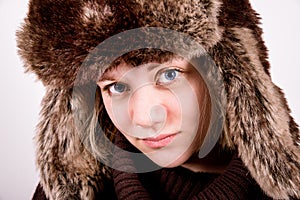 Cute blue eyed girl with ushanka photo