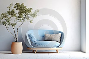 Cute blue loveseat sofa or snuggle chair and pot with branch. Interior design of modern living room with white wall with copy