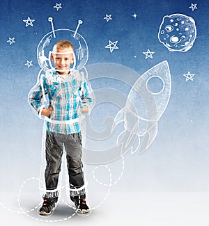 Cute boy as a small astronaut