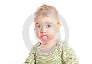 Cute boy with a baby's dummy