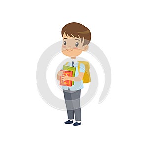 Cute boy with backpack holding books, pupil in school uniform studying at school vector Illustration on a white