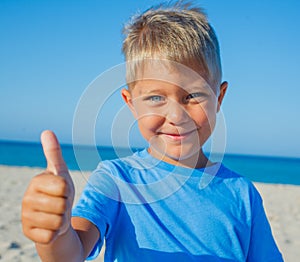 Cute boy on the beach