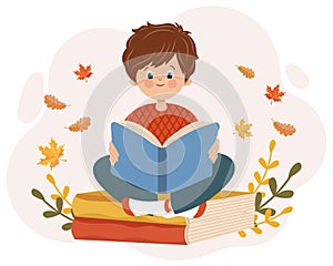A cute boy with a book sits on books and dreams. Cartoon autumn illustration, children\'s print vector