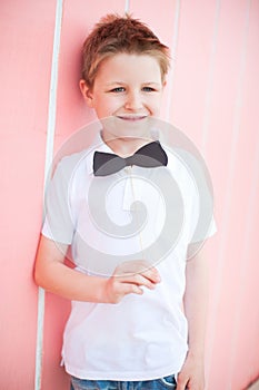 Cute boy with bow tie party accessory