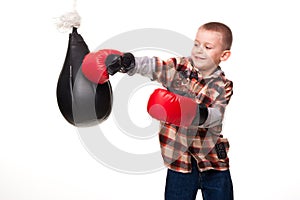 Cute boy in the boxing gloves