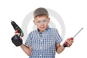 A cute boy builder in checkered shirt demonstrates the difficulty of choosing a tool, isolated on white background