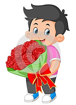 A Cute boy carrying a huge bouquet of roses