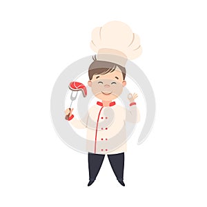 Cute Boy Chef Cooking Meat Steak, Kid in Chef Uniform Cooking in Kitchen Cartoon Style Vector Illustration