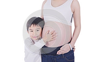 Cute boy expecting newborn