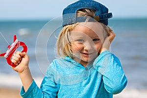 Cute boy flying kite
