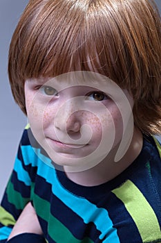 Cute boy with freckles portrait photo