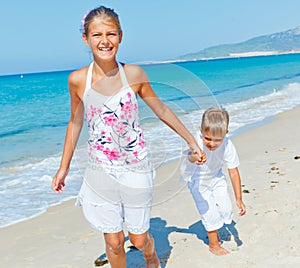 Cute boy and girl on the beach