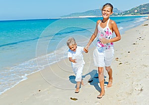 Cute boy and girl on the beach