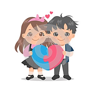 Cute boy and girl in love holding a heart shape puzzle. Match couple concept.