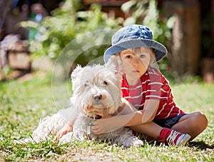 Cute boy with his dog friend