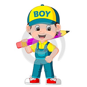 Cute boy holding big pencil