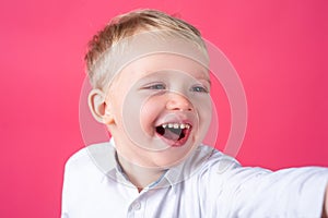 Cute boy, isolated. Portrait of a smiling boy. Funny little boy. 4-5 years old.