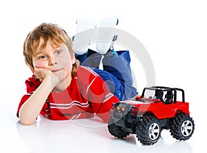 Cute boy lying on floor