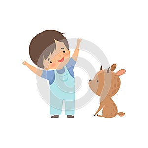 Cute Boy Playing with Baby Deer, Kid Interacting with Animal in Contact Zoo Cartoon Vector Illustration