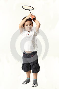 Cute boy playing batminton photo