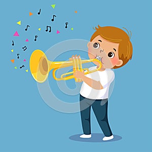 Cute boy playing the trumpet on blue background