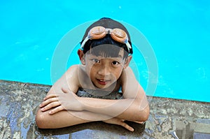 Cute Boy at the Poolside