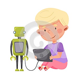 Cute Boy Sitting with Tablet PC and Configurating Robot Vector Illustration