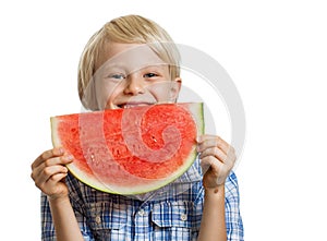 Cute boy smiling behind water melon