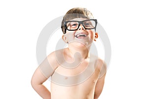 Cute boy smiling with large, goofy glasses