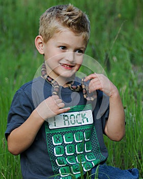 Cute boy and snake