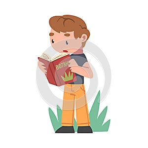 Cute Boy Standing with Open Book in his Hands, Kid Reading and Learning about Plants Cartoon Vector Illustration