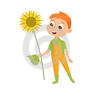 Cute Boy with Sunflower, Little Kid Farmer Character in Overalls Working in Garden Cartoon Style Vector Illustration