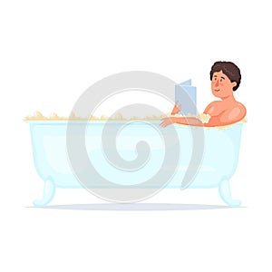 Cute boy take a bath in ceramic bathtub and read book