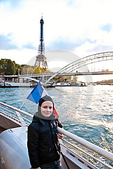 Cute boy travelling in Paris