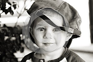 Cute boy wearing baseball hat