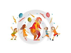 Cute Boys and Girl Celebrating Kids Party, Happy Children Having Fun with Clown at Birthday, Carnival Party or Circus