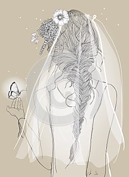 Cute bride with a veil and braid