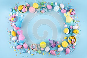 Cute and bright pastel colored Easter eggs and bunny background