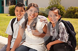 Cute Brothers and Sister Ready for School