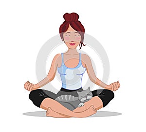 Cute brunette woman doing yoga lotus position with a cat.