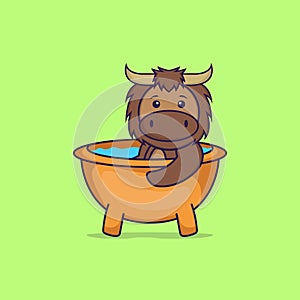 Cute bull taking a bath in the bathtub. Animal cartoon concept isolated. Can used for t-shirt, greeting card, invitation card or