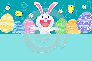 cute bunny with easter eggs on top of blank space