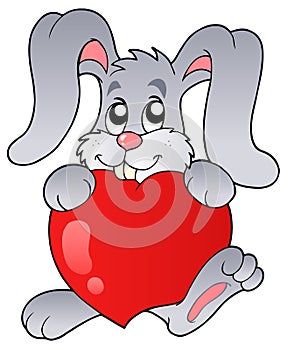 Cute bunny holding heart