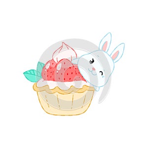 Cute bunny and a strawberry dessert