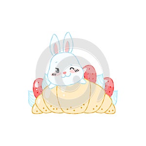 Cute bunny and a strawberry dessert