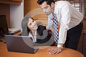 Cute businesswoman flirting